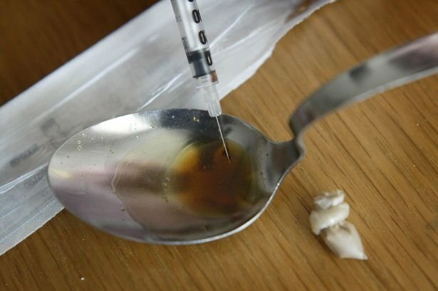 Needle syringe spoon and suspected drug paraphernalia requiring specialist clearance